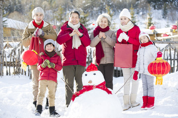 Fototapeta na wymiar Happy family celebrating Chinese new year