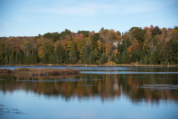 Fototapeta na wymiar Autumn, lake view and camping in Quebec, Canada