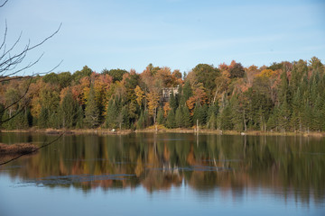 Autumn, lake view and camping in Quebec, Canada