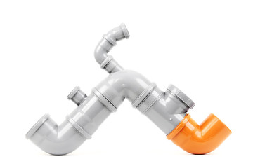 New gray and orange drain pipe isolated on white
