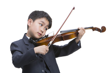 Little boy playing the violin
