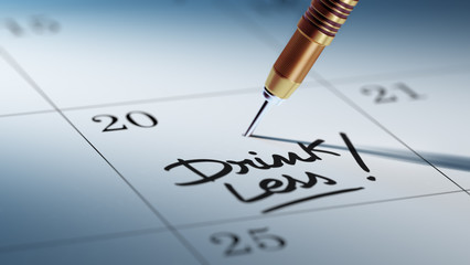 Concept image of a Calendar with a golden dart stick.. The words