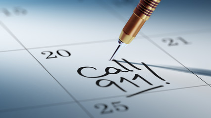 Concept image of a Calendar with a golden dart stick.. The words