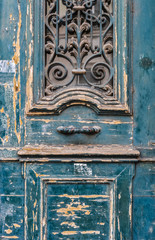 Antique wood door with green paint