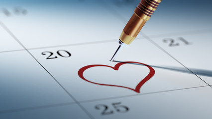 Concept image of a Calendar with a golden dart stick.. The words