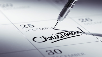 Fototapeta premium Concept image of a Calendar with a golden dart stick.. The words