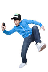 Excited man looking at his phone