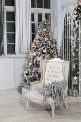 Beautiful holdiay decorated room with Christmas tree