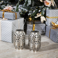 Christmas celebration things: firtree with gifts under it, decor