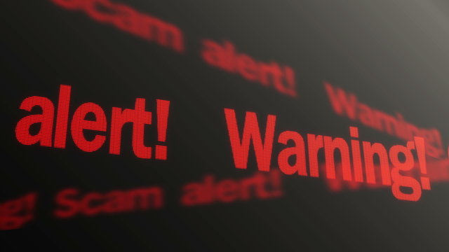 Warning, scam alert text running on PC display. Data theft prevention, security