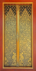 Wooden door in Thai temple or Thai church 