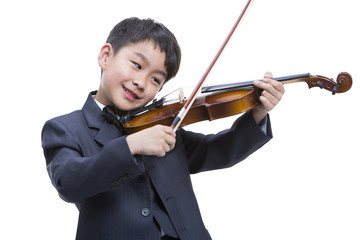 Little boy playing the violin