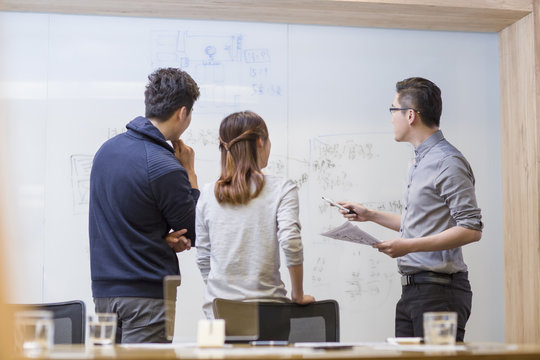IT workers having a meeting in board room