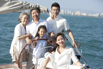 Happy family sailing