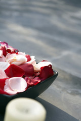 Tranquil Scene Of Flower Petals And A Candle