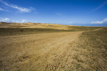 Fototapeta na wymiar Dirt road in a wilderness area in Qinghai province, China