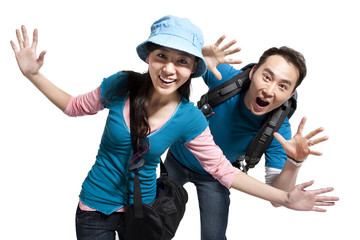 Portrait of young couple travelling