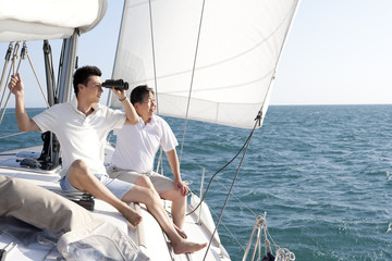 Father and son sailing