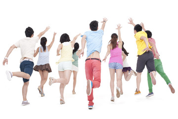 Obraz premium Excited young people jumping