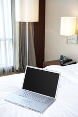 Laptop in a hotel room