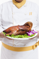 Chubby cook with roast duck