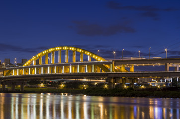 Fototapeta na wymiar Sunset and night view of MacArthur No. 1 Bridge