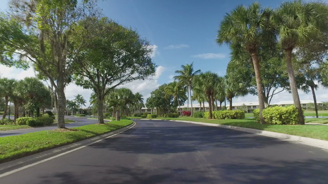 Riding cruiser bicycle in gated Florida community