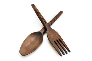 table spoon and fork from wood on white background