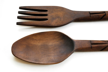 table spoon and fork from wood on white background