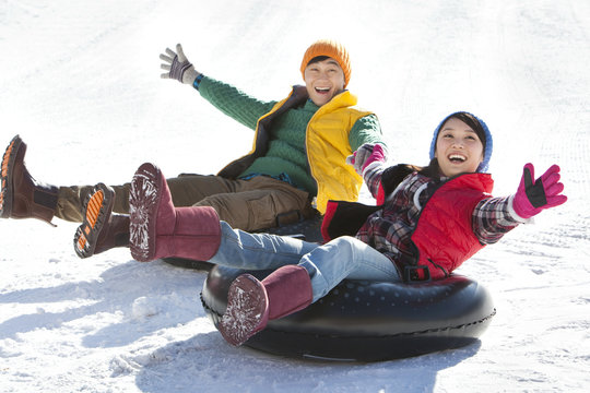 Happy young people having fun in ski resort