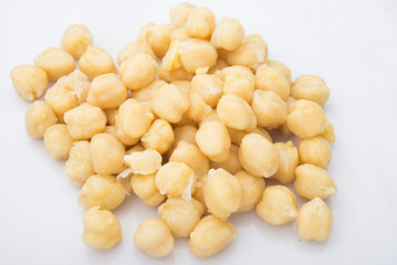 Pile of chickpeas against white background