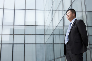 Businessman contemplating