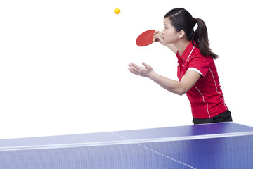 Female athlete playing table tennis 