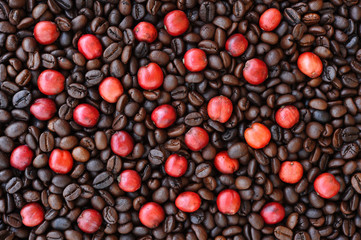 red ripe coffee on coffee beans backgournd