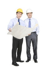 Construction managers in hard hats