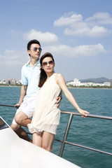 Couple Relaxing on a Yacht