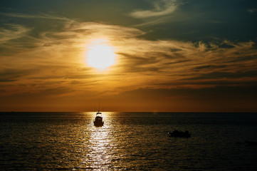 Picturesque sea view with sunset and horizon line in Andaman sea near Phuket