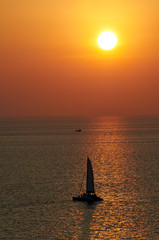 Picturesque sea view with sunset and horizon line in Andaman sea near Phuket