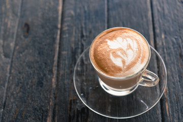 Cup of latte Coffee on wood table