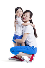 Mother and daughter embracing