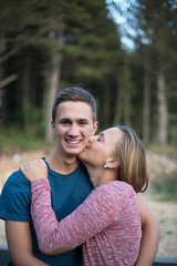 Fototapeta premium Cute couple in the park on a sunny day