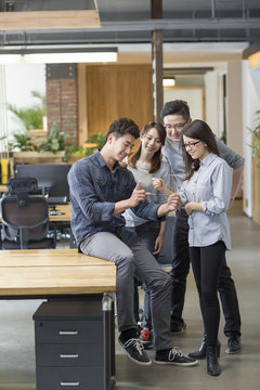 IT workers developing digital tablet