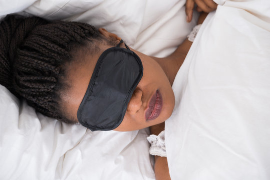 Woman Wearing Eyemask While Sleeping