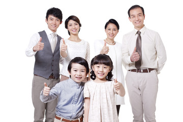 Cheerful family doing thumbs up