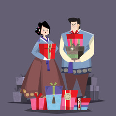 
Couple in Korean traditional costume with holiday gifts