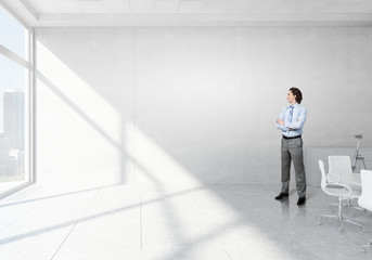 Businessman in modern interior