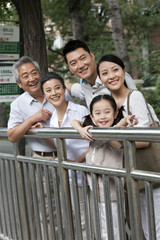 Chinese family at bus stop