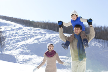 Family having fun in snow