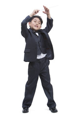 Boy dressing up like a conductor