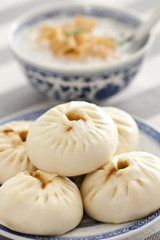 Chinese food rice porridge and steamed buns